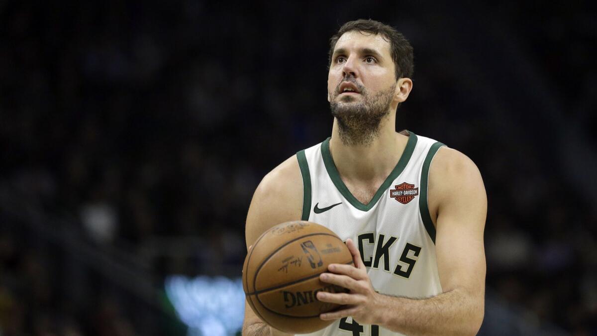 Milwaukee's Nikola Mirotic shoots a free throw during a game against the Charlotte Hornets on March 9.