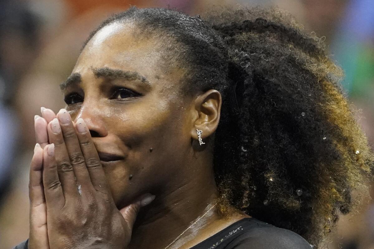 Serena Williams reacts after losing to Ajla Tomljanovic in the third round of the U.S. Open.