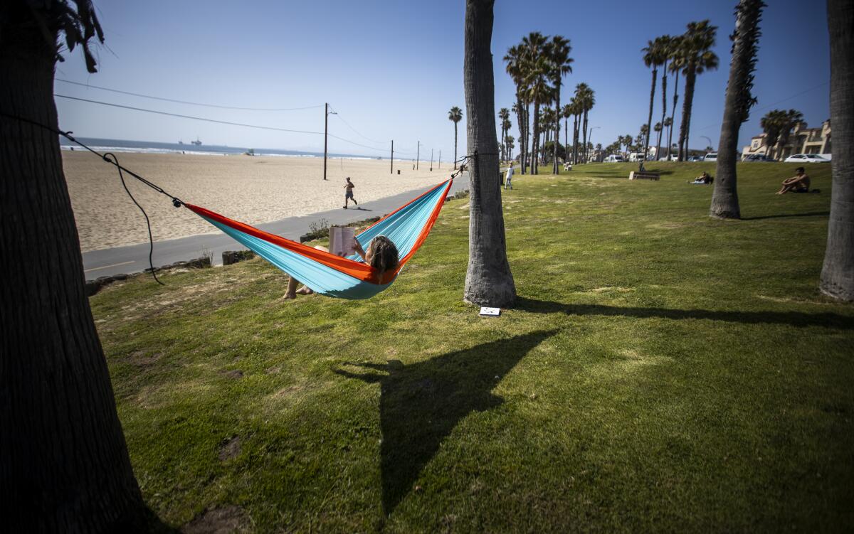 Kylie Wortham spends time near the sand in Huntington Beach.