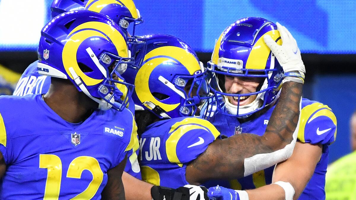 Cooper Kupp pays homage to Isaac Bruce after breaking Rams' single-season  receptions record