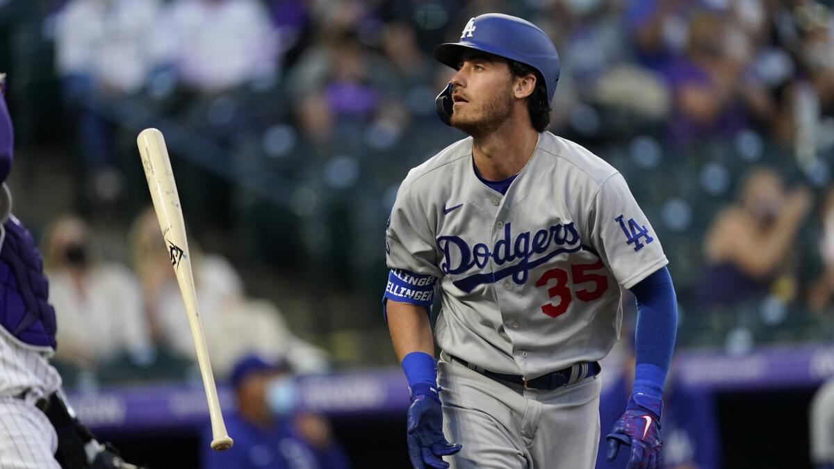 Dodgers center fielder Cody Bellinger tosses his bat during a game against the Colorado Rockies on April 2.