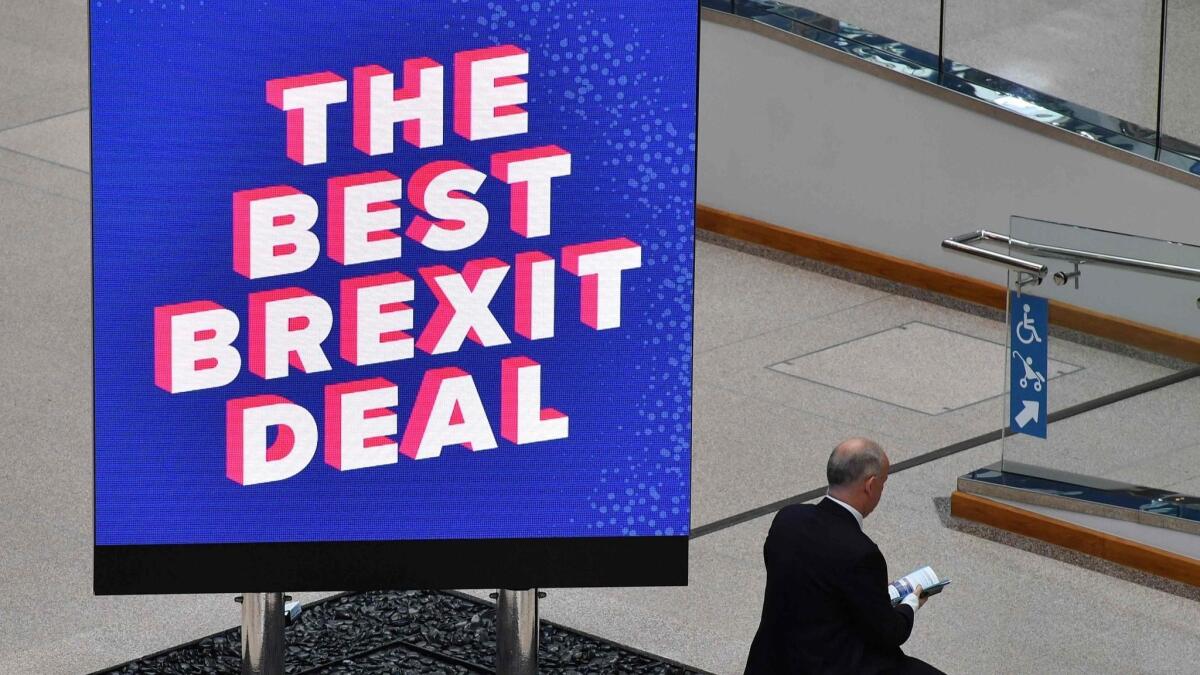 A delegate at the Conservative Party conference at the International Convention Center in Birmingham, England, on Sept. 30, 2018.