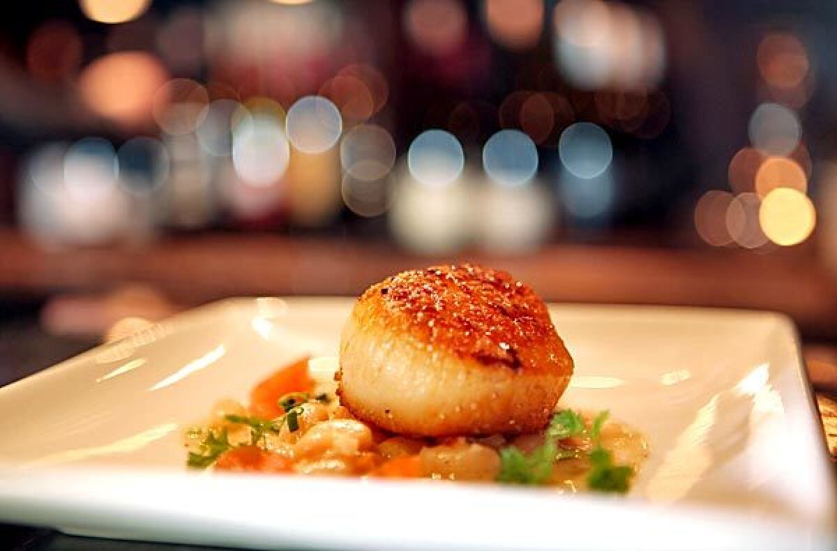The Sunday supper menu at Noir Food & Wine has included scallop.