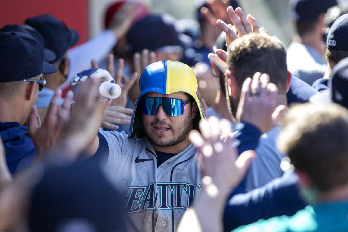 Mariners glad to have Carlos Santana even with Ty France back in