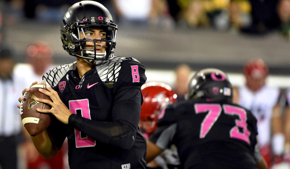 Quarterback Marcus Mariota (8) will lead the Ducks into the Rose Bowl on Saturday night for a key Pac-12 Conference game against the Bruins.