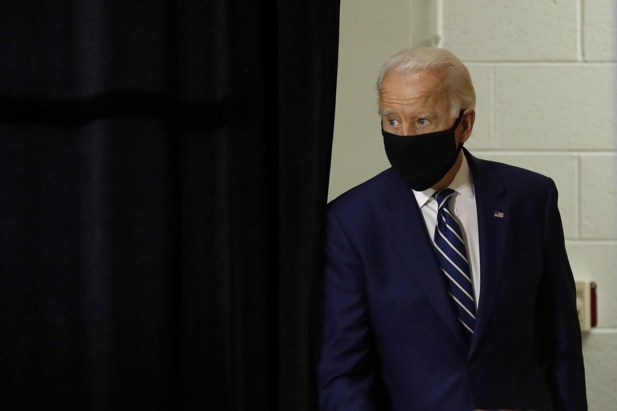 Joe Biden arrives to speak at a campaign event Tuesday in New Castle, Del.