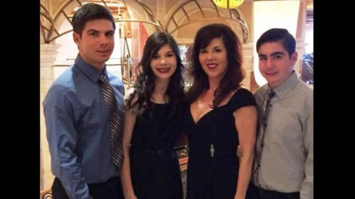 Marylou Sarkissian, third from left, is pictured with her three children before her death in 2016.