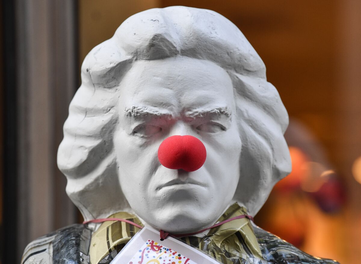 A bust of Ludwig van Beethoven adorned with a red nose in Bonn, Germany.