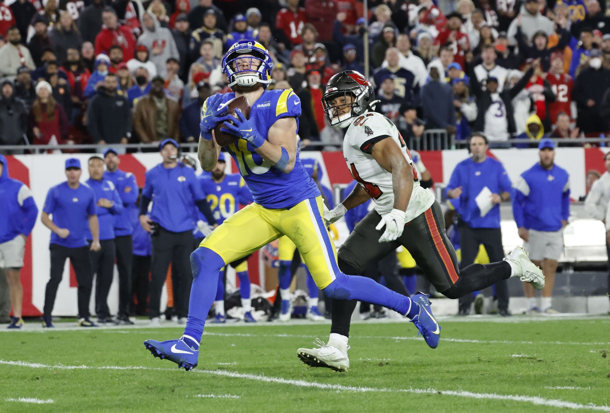  Rams wide receiver Cooper Kupp hauls in a catch against Buccaneers cornerback Carlton Davis.