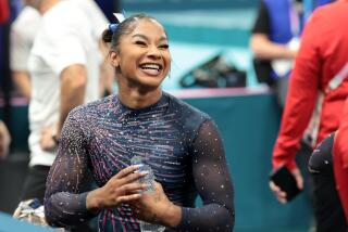 PARIS, FRANCE July 24, 2024-U.S. gymnast Jordan Chiles smiles during podium training.