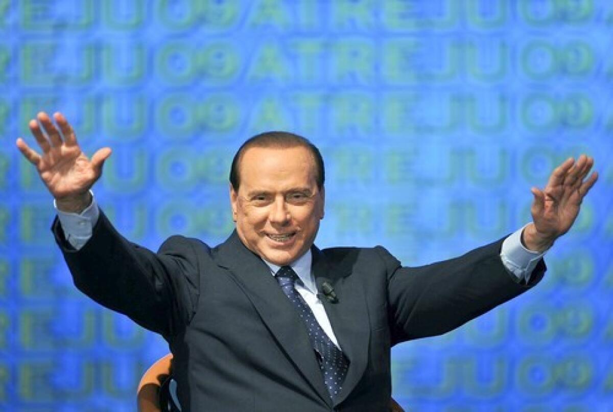For Italian Prime Minister Silvio Berlusconi, seen at a gathering in Rome, the fundamental element of his popularity is the fact that he controls 90-95% of all Italian television, says preeminent Italian political scientist and columnist Giovanni Sartori.