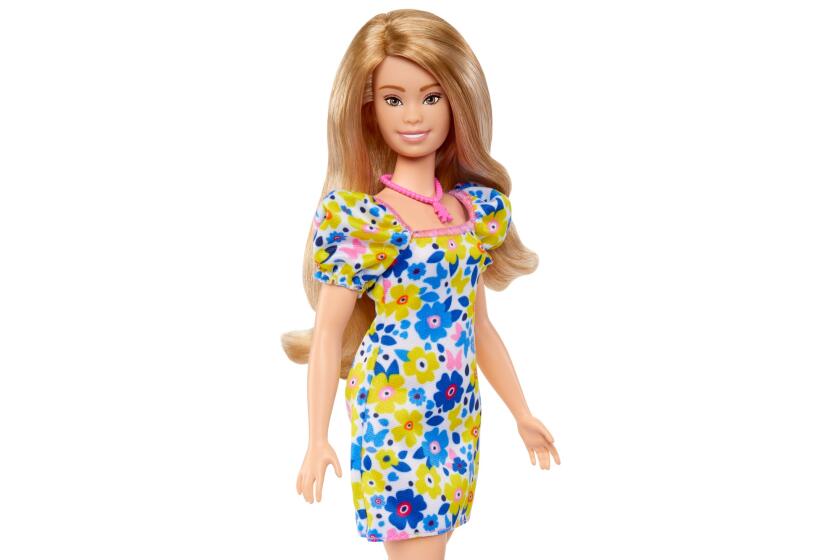 A standing Barbie doll