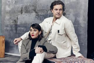 "Fatal Attraction" miniseries stars Lizzy Caplan (seated between Jackson's legs) and Joshua Jackson pose for photos at TCA.
