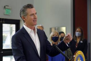Wilmington, Los Angeles, California, Oct. 21, 2021-Governor Gavin Newsom speaks during a press conference at the Wilmington Boys & Girls Club on Oct. 21, 2021, to announce new state efforts to better protect communities near oil fields through stricter regulations. (Carolyn Cole / Los Angeles Times)