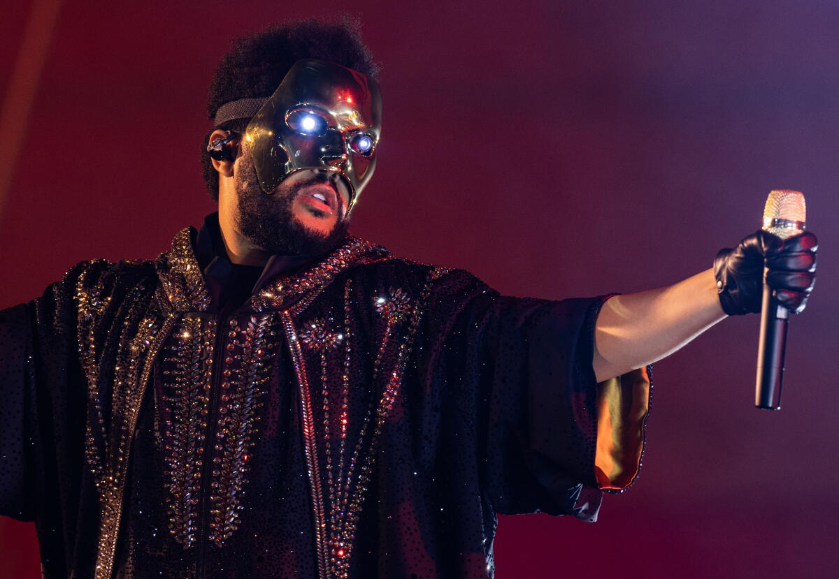 Weeknd Taking Mask Off The Weeknd conquers SoFi Stadium with an immaculate performance - Los ...
