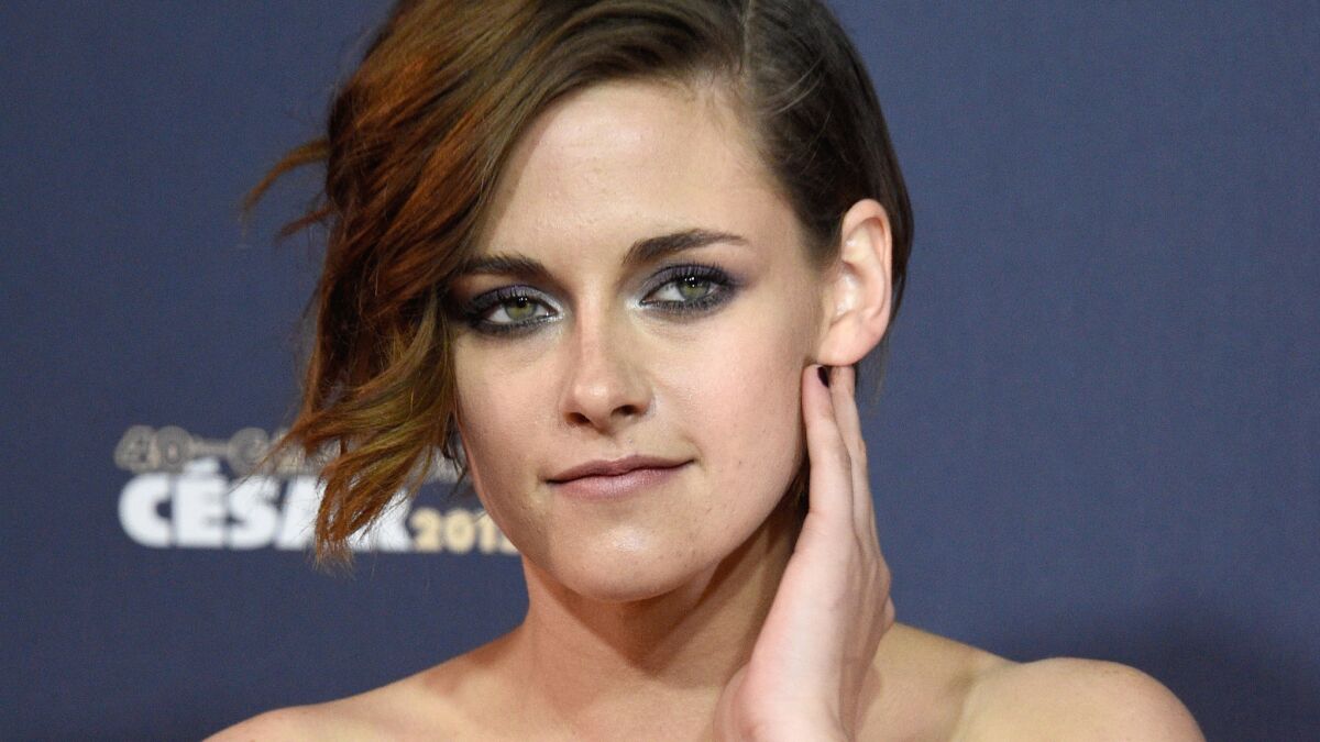 Kristen Stewart is dating her personal assistant, the actress' mom has confirmed to a British newspaper.