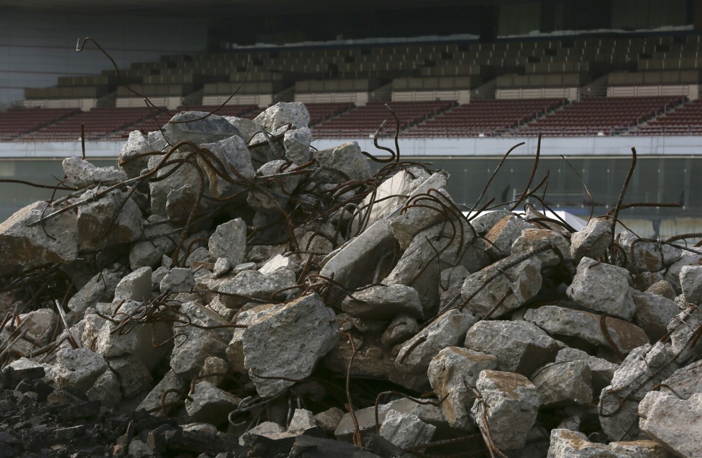 Piles of broken concrete from the old grandstands await the crusher at the future home of the Rams at the old Hollywood Park racetrack in Inglewood on Jan. 13.