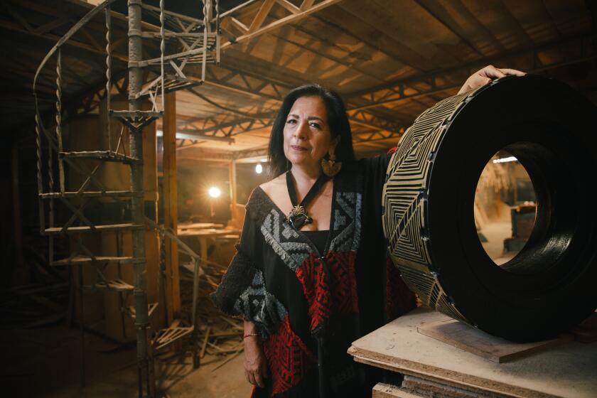 MEXICO CITY -- JULY 12, 2024: Artist Betsabee Romero at her Mexico City studio on July 12, 2024. (Brigitte Diez / For The Times)