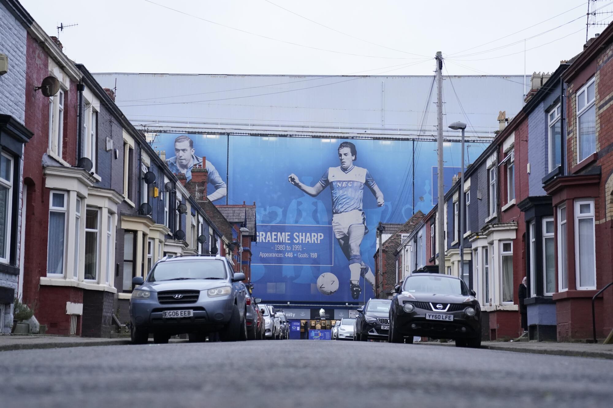 Cars are parking outside of the of Goodison Park stadium ahead of the English Premier League soccer match