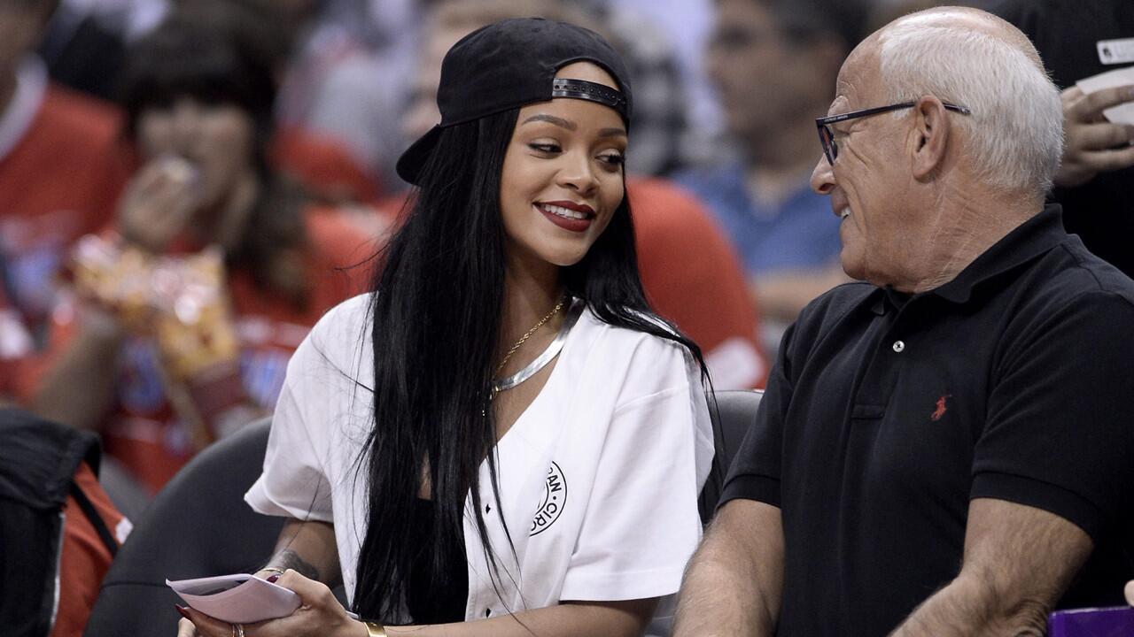 After breaking the L.A. Police Commission president's phone in a selfie mishap at a Clippers game, the singer signed the hardware with "sorry, I [heart] LAPD." The iPhone was auctioned for $66.5 grand, with proceeds going to the LAPD Foundation. Rihanna also donated $25,000 to the fund.