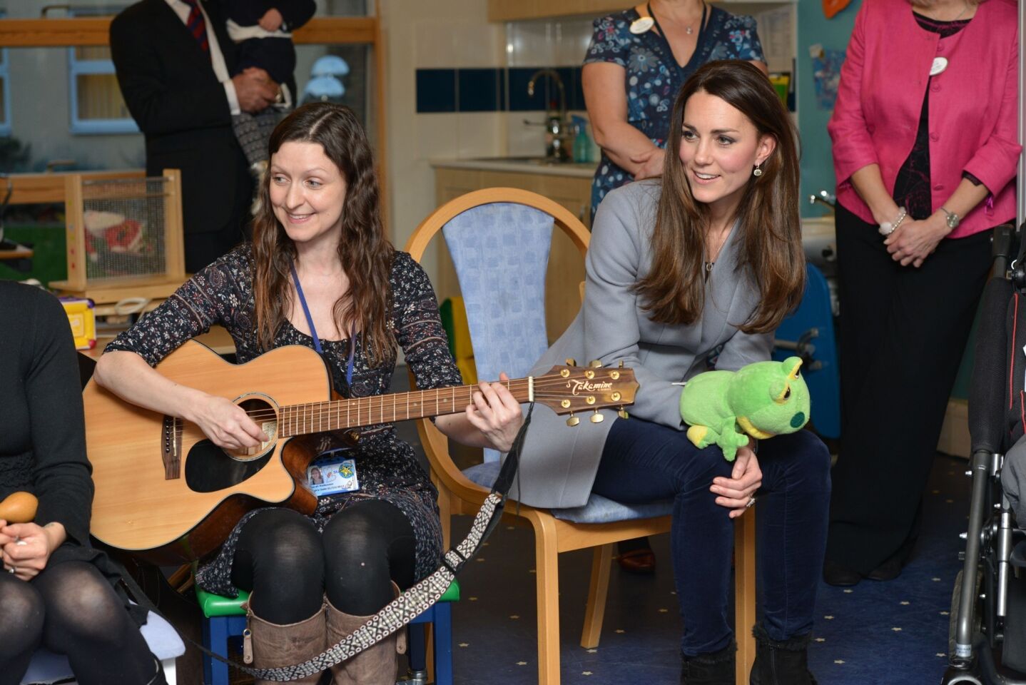 Catherine, Duchess of Cambridge, visits the Shooting Star House Children's hospice where she toured facilities, viewed a music session and met with volunteers on Dec. 6, 2013, in Hampton, England.