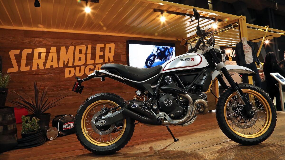 A group of industry veterans met prior to the Progressive International Motorcycle Show in Long Beach to discuss new sales strategies. The Ducati Scrambler, seen here at the 2016 show, was cited as an example of smart marketing.