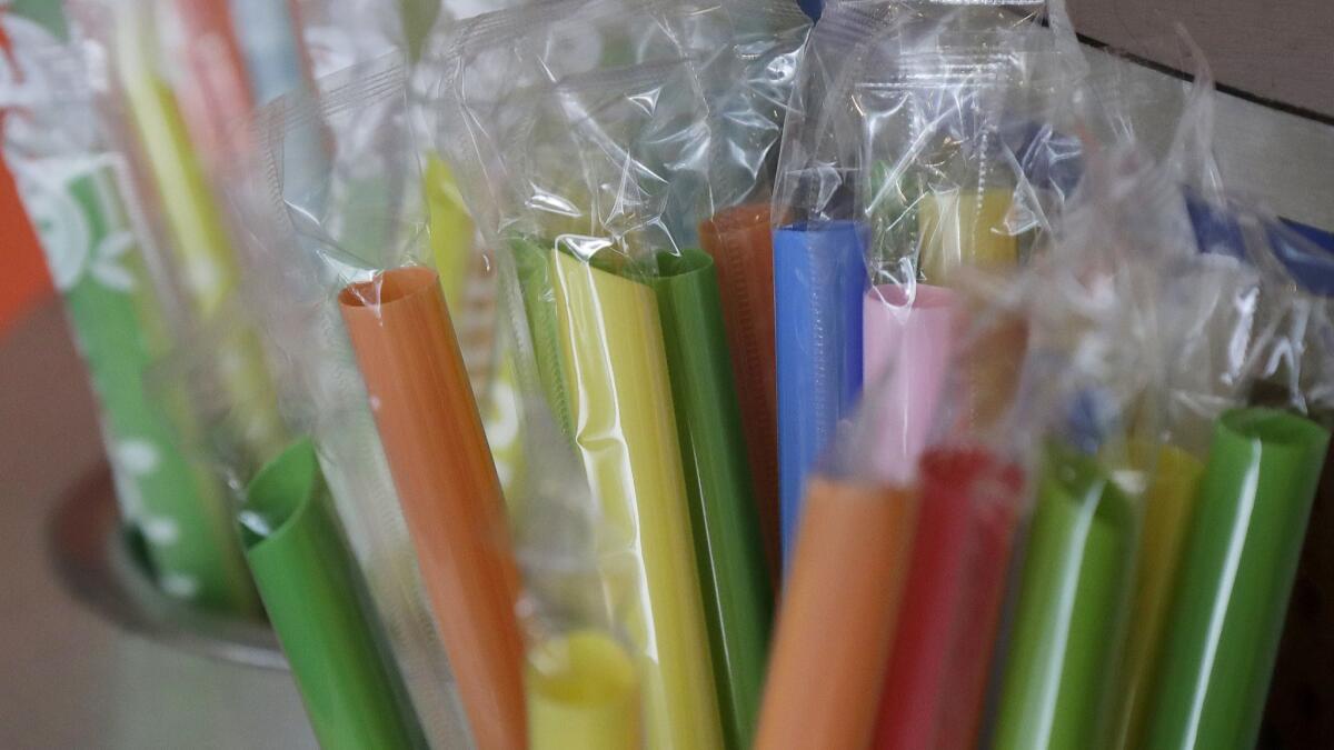 Wrapped plastic straws at a cafe in San Francisco, where tiny coffee stirrers and cup pluggers are banned.