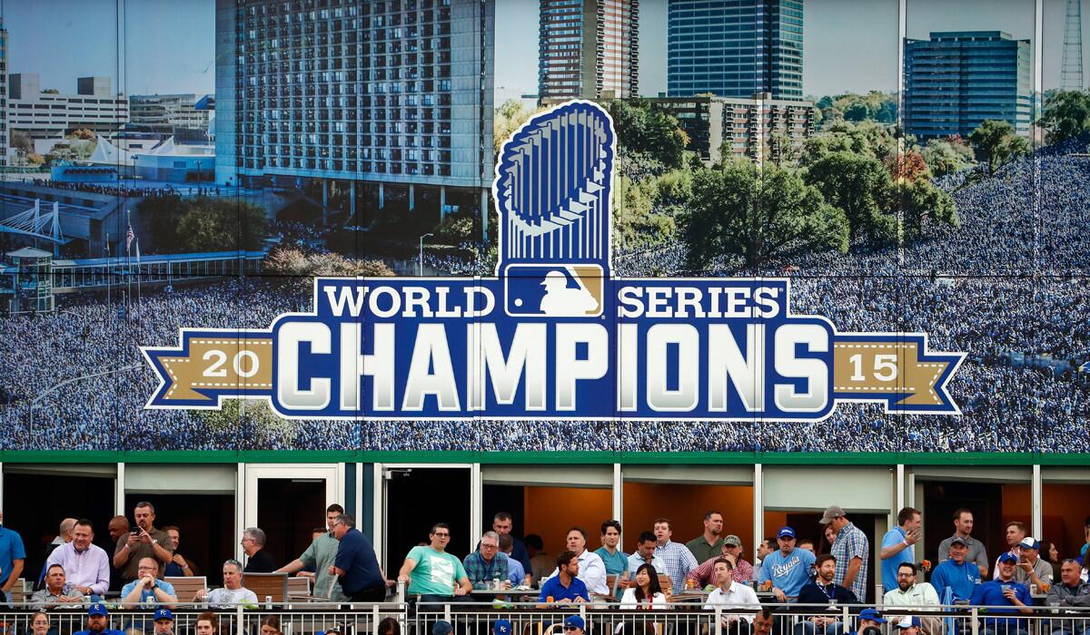 A billboard commemorating the Kansas City Royals' 2015 World Series win is seen in left field during a game between the Detroit Tigers and the Kansas City Royals on April 19.