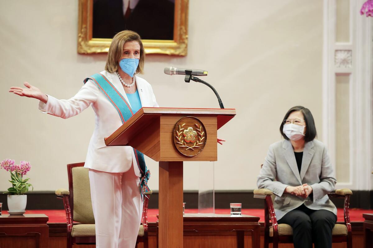 FILE - In this Taiwan Presidential Office photo, U.S. House Speaker Nancy Pelosi speaks during a meeting with Taiwanese President President Tsai Ing-wen, right, in Taipei, Taiwan, on Aug. 3, 2022. China's Foreign Ministry accused the United States of violating its commitment to the “one-China” principle and interfering in internal Chinese affairs on Thursday, Sept. 15, 2022, after the U.S. Senate Foreign Relations committee approved a new bill that could significantly increase American defense support for the island of Taiwan. (Taiwan Presidential Office via AP, File)