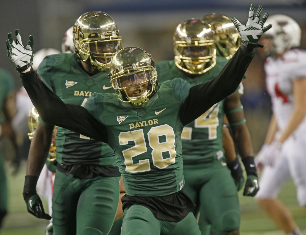 Baylor safety Orion Stewart celebrates a defensive stop during Saturday's 63-34 win over Texas Tech. The Bears will look to upset Oklahoma State on Saturday.