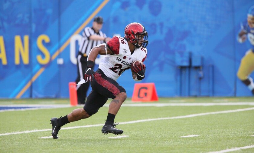 San Diego State's Kaegun Williams returns the opening kickoff against San Jose State for a 95-yard touchdown.