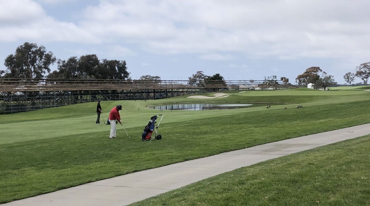 Ryan Connolly prepares to hit onto the 18th green at the Torrey Pines South Course.