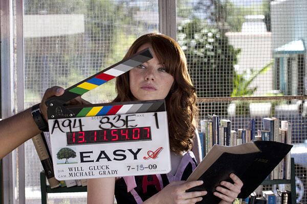 Emma Stone is framed by a clapperboard on the set of "Easy A." July 13, 2009