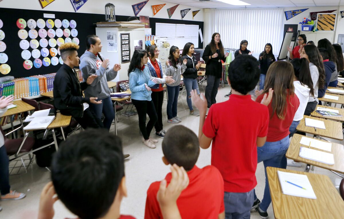 Roosevelt Middle School Pathway to College teacher Pam Zamaris uses restorative-justice practices to communicate and discipline students instead of issuing timeouts, office referrals and suspensions.
