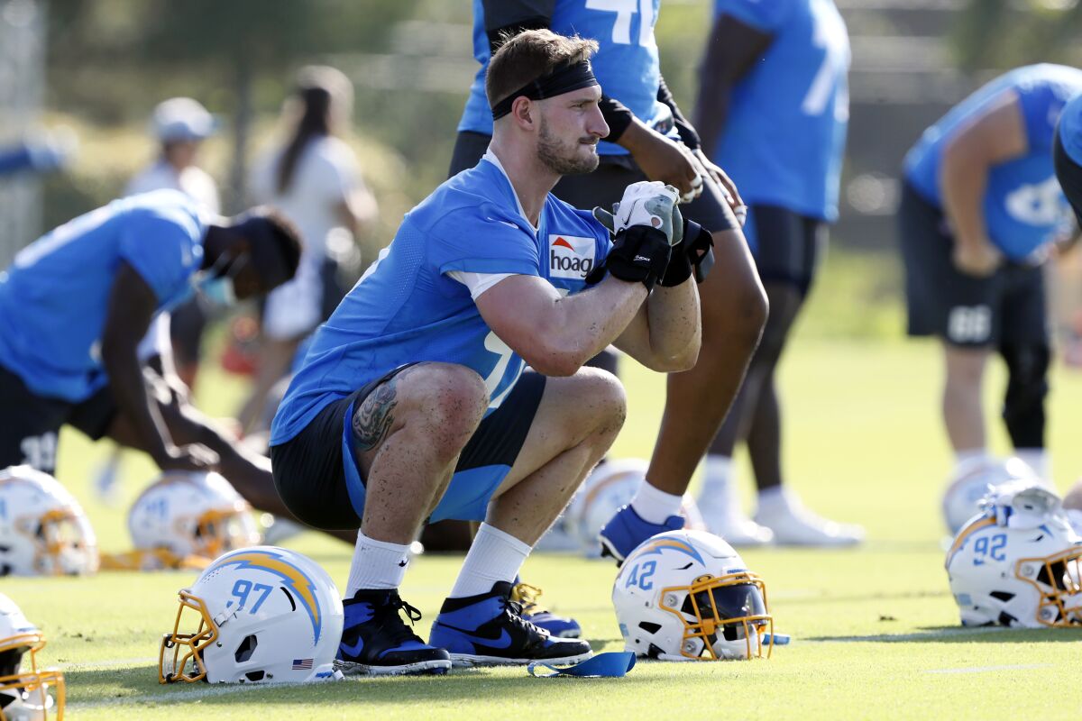 Los Angeles Chargers defensive end Joey Bosa (97) works a drill during practice at the NFL football team's training camp in Costa Mesa, Calif., Wednesday, July 28, 2021. (AP Photo/Alex Gallardo)