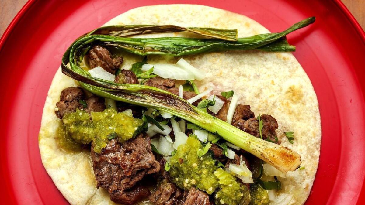 The Sonora taco, made with grilled steak and a stalk of green onion, at Colonia Taco Lounge — soon in Whittier.
