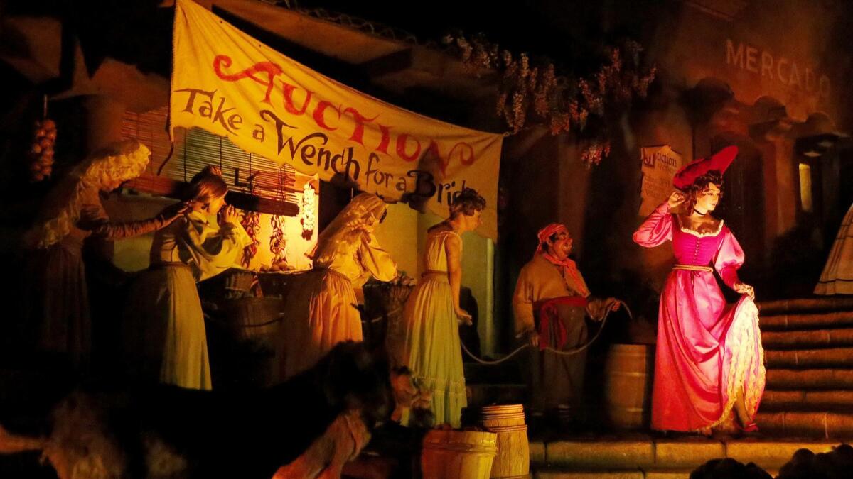 The Pirates of the Caribbean bride auction scene in 2017 before the transformation of the lady in red to Redd the female pirate.