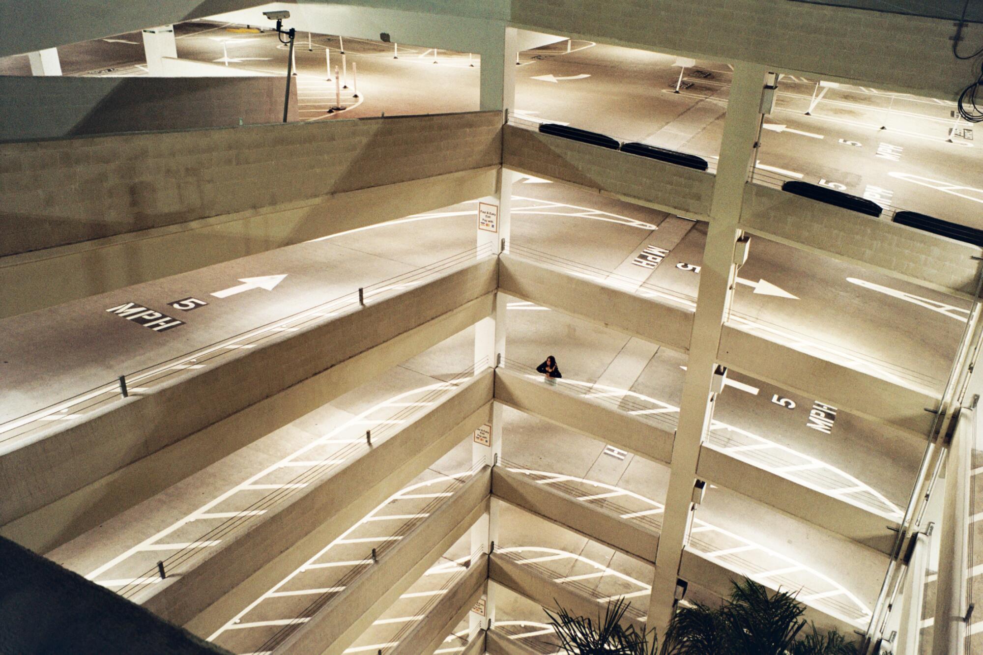 A lit-up, multilevel parking garage