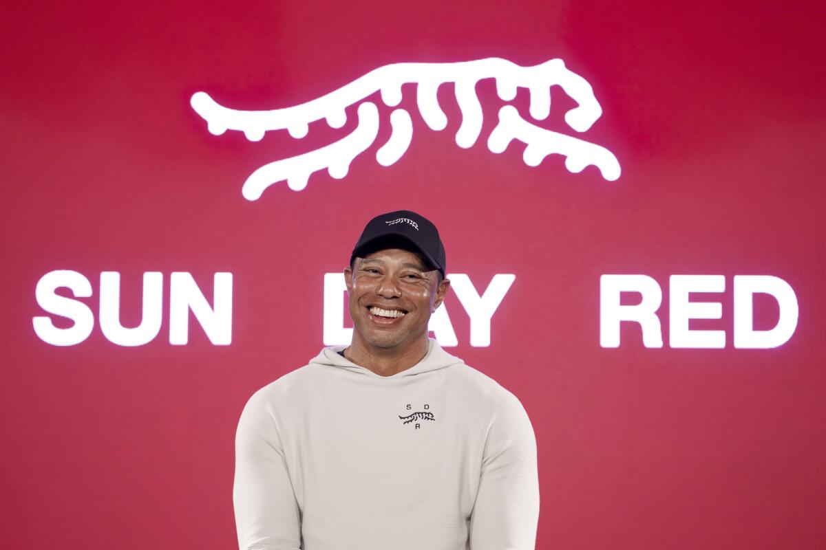 Tiger Woods draws opinions from fashion world after unveiling of his Sun  Day Red apparel line - The San Diego Union-Tribune
