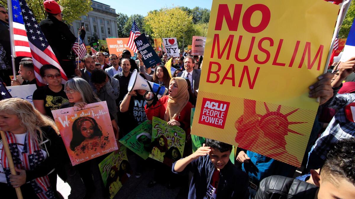 Protesters rally in Washington in October to decry President Trump's travel restrictions on visitors from Chad, Iran, Libya, North Korea, Syria, Venezuela and Yemen.