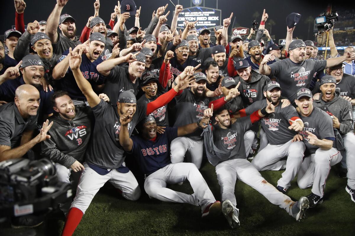 Boston Red Sox players celebrate after defeating the Los Angeles Dodgers in game five of the World Series at Dodger Stadium in Los Angeles, California, USA, 28 October 2018. The Red Sox win the series 4-1 to become the World Champions of Major League Baseball.