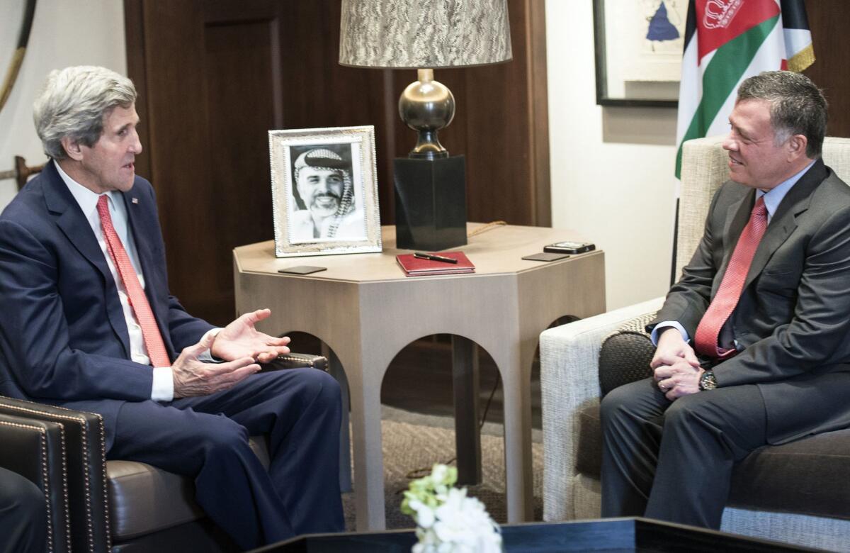 Secretary of State John Kerry, Left, speaks with Jordan's King Abdullah II before a meeting at Al-Hummar Palace in Amman.