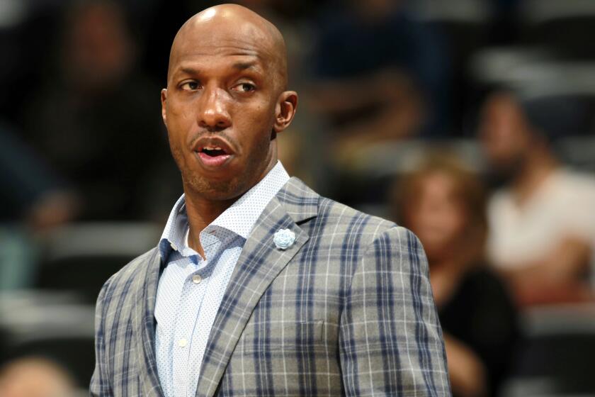 FILE - In this March 19, 2014 photo, Detroit Pistons guard Chauncey Billups watches from the sideline during an NBA basketball game against the Denver Nuggets in Denver. A person familiar with the situation says Billups has not made a decision about joining Cleveland’s front office. Billups is weighing several factors and remains unsure if he wants to head up the Cavs’ basketball operations, said the person who spoke Monday, June 26, 2017 to the Associated Press on condition of anonymity because of the sensitive nature of the talks. (AP Photo/David Zalubowski, File)