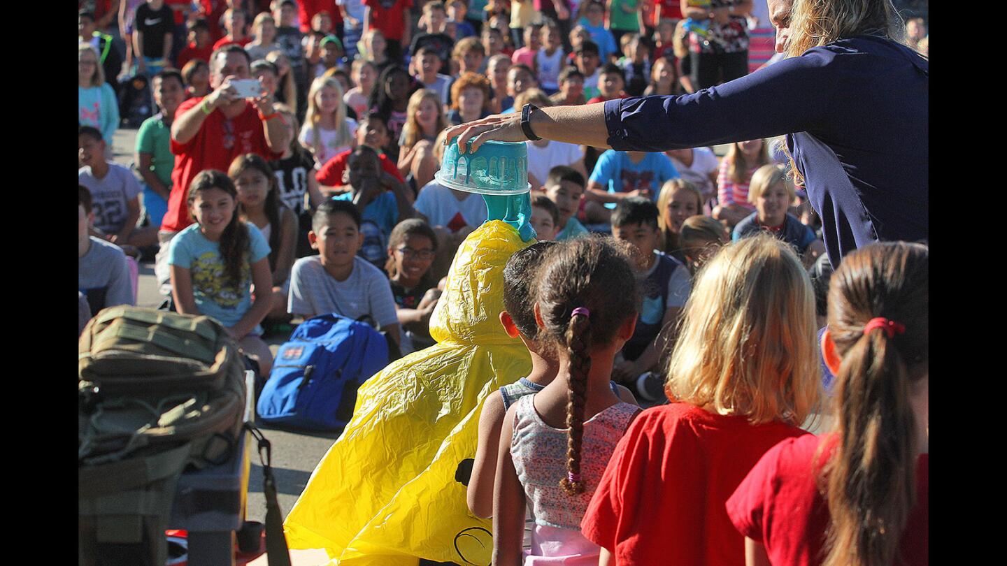 Photo Gallery: Principal slimed after students read 100,000 minutes in two weeks