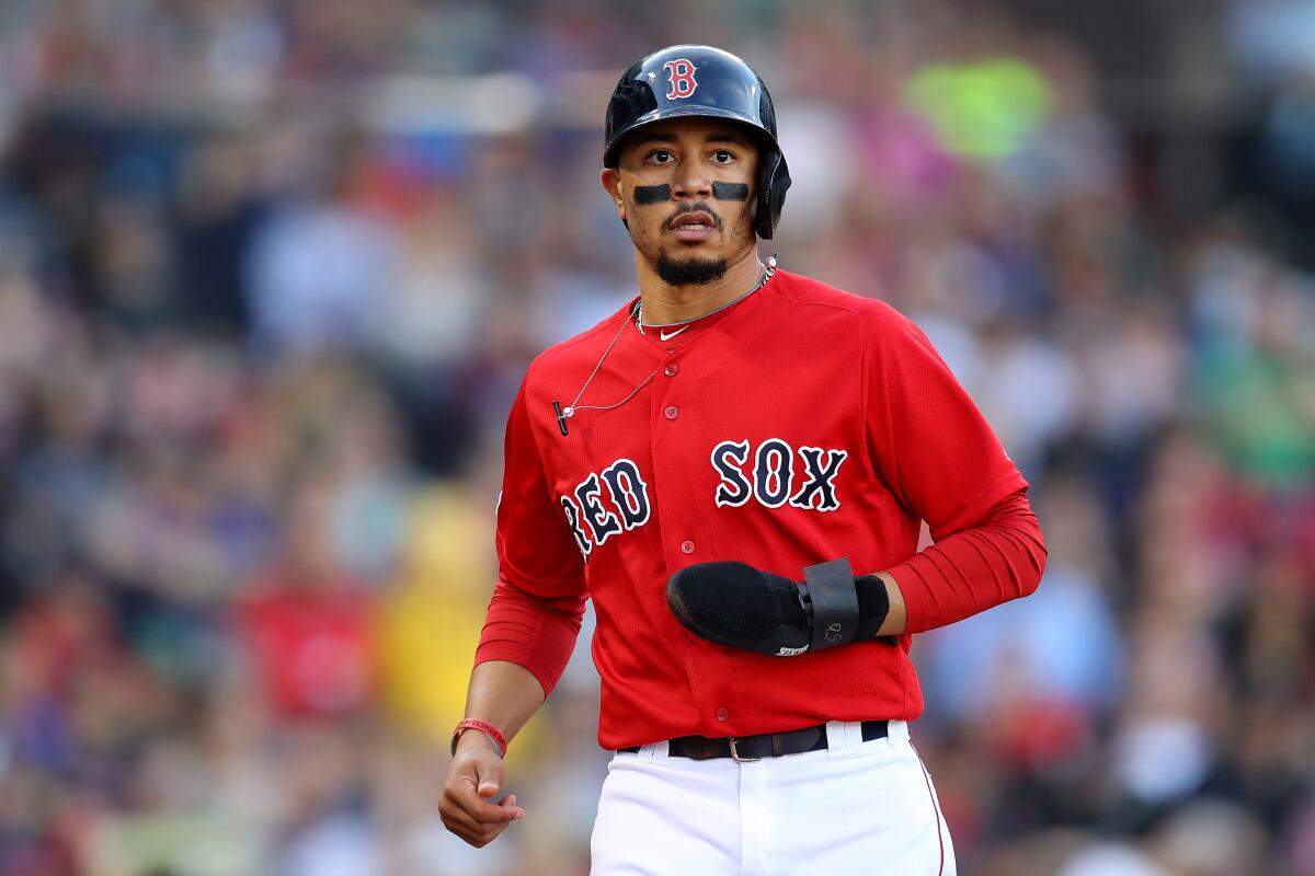 The Dodgers have been in talks with the Boston Red Sox about acquiring outfielder Mookie Betts, according to a person with knowledge of the situation.