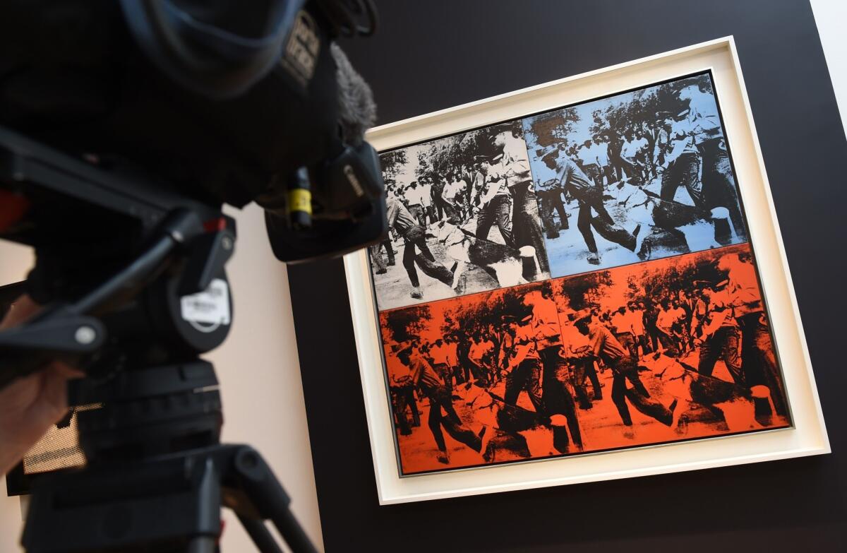 Andy Warhol's "Race Riot," created in 1964, on display during a preview at Christie's in New York.