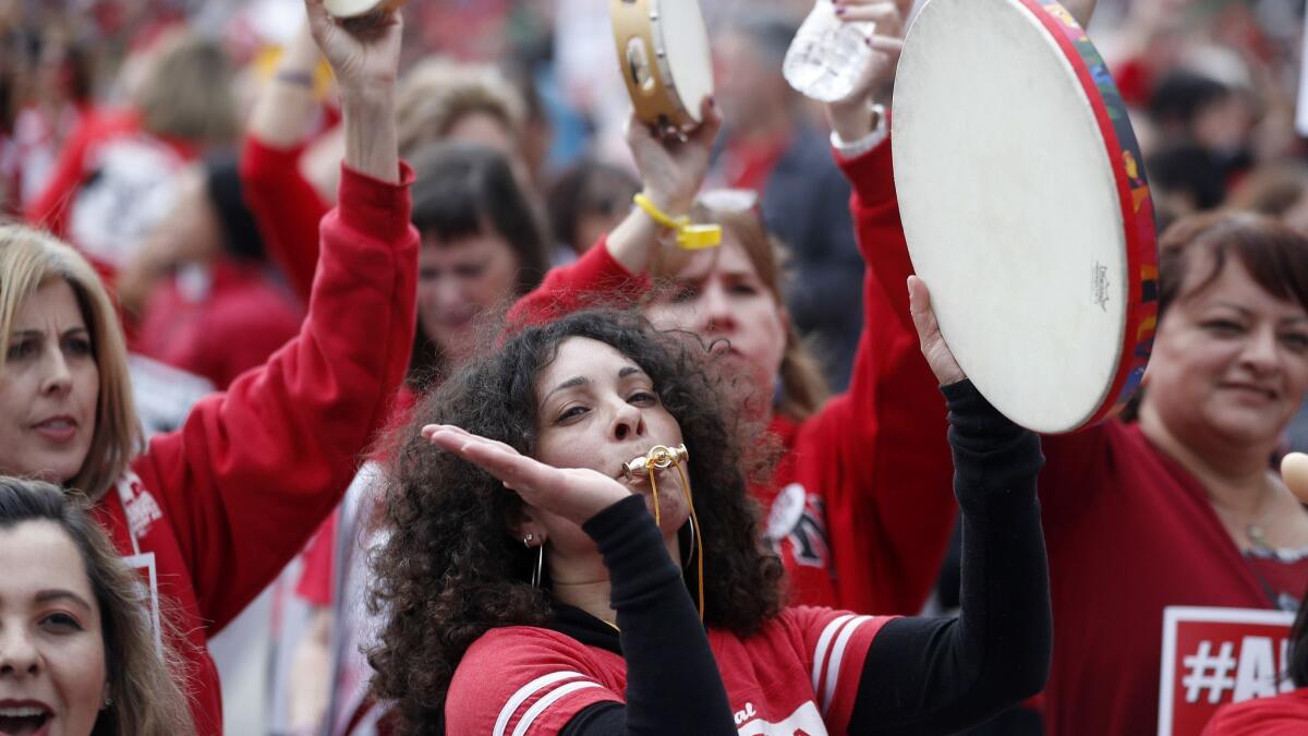 Teachers at a May rally for a new contract in downtown Los Angeles. Their union, United Teachers Los Angeles, is holding out for a better deal.