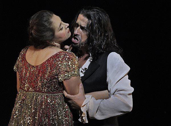 Oksana Dyka as Tatiana and Dalibor Jenis as Eugene Onegin in Los Angeles Opera's production of "Eugene Onegin" at the Dorothy Chandler Pavilion.