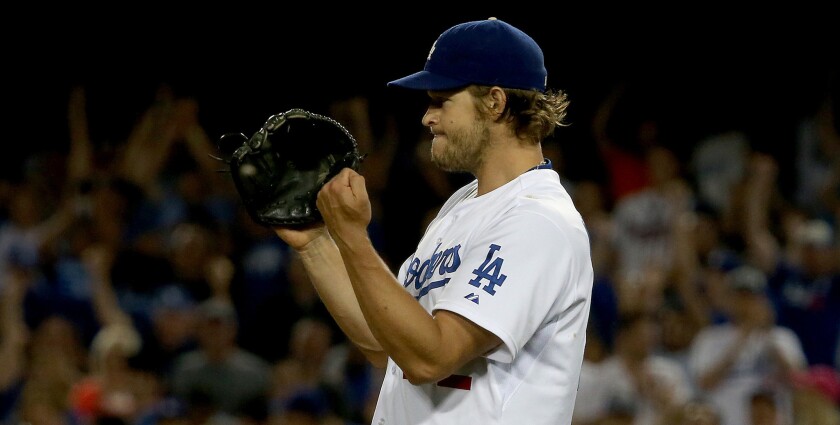 Clayton Kershaw reacts after pitching his fifth complete shutout of the season on July 31, a 2-1 win over the Atlanta Braves. Kershaw gave up one earned run on nine hits while striking out nine batters.