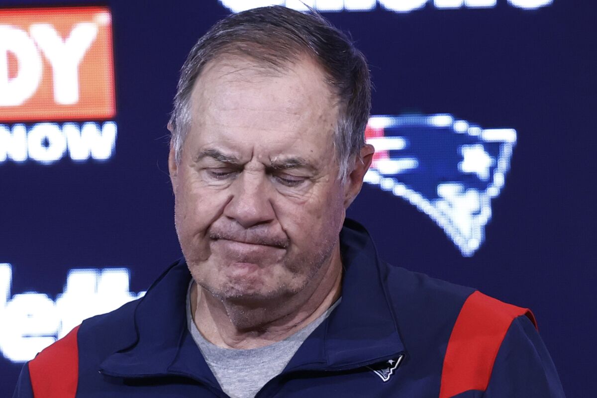 New England Patriots head coach Bill Belichick reacts during a news conference after a 17-16 loss to the Miami Dolphins in an NFL football game, Sunday, Sept. 12, 2021, in Foxborough, Mass. (AP Photo/Winslow Townson)